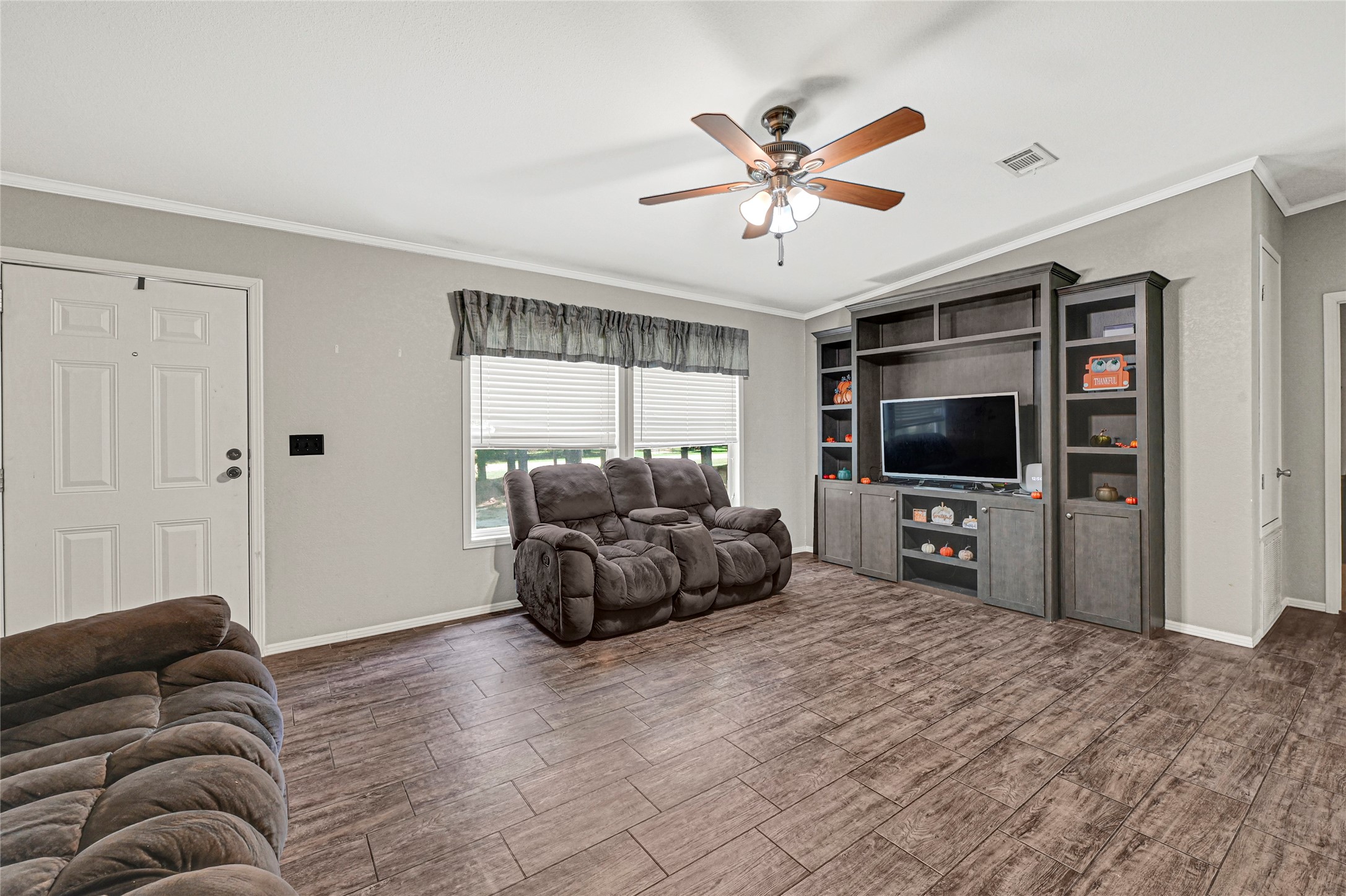 635 County Road 2175 Shepherd, TX 77371 - Photo 5 of 27 a living room with furniture and a flat screen tv