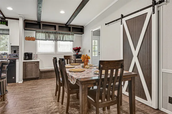 a view of a dining room with furniture