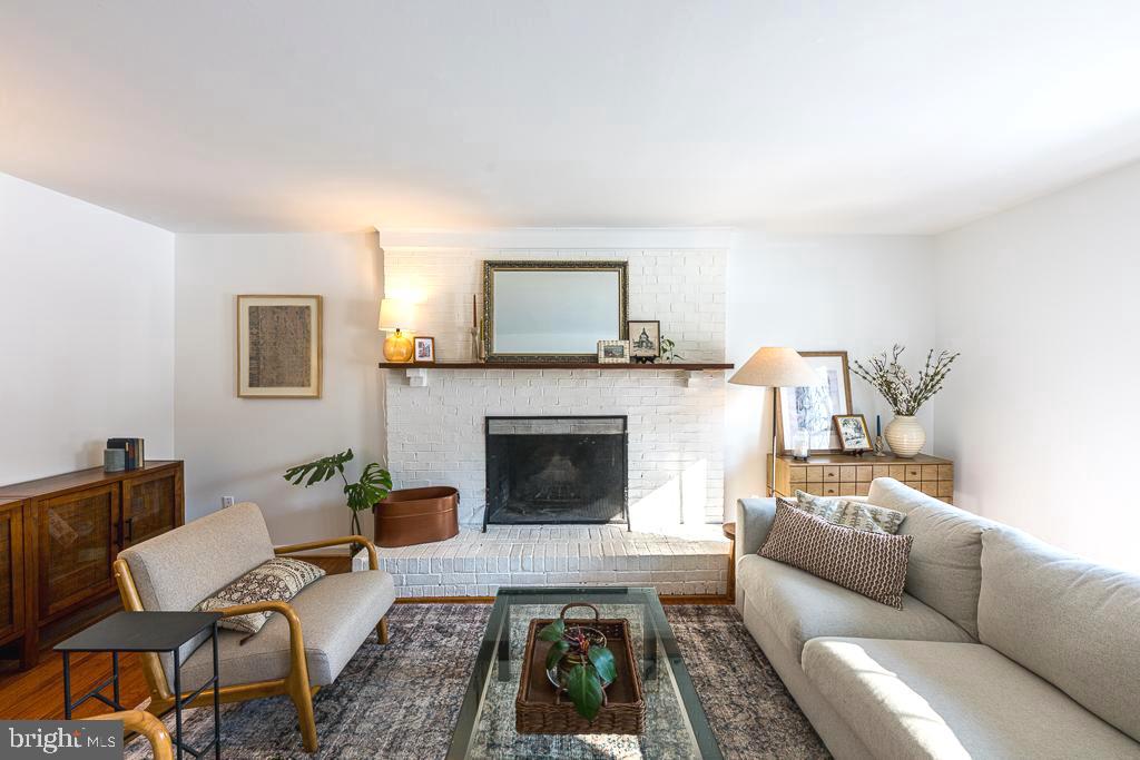 2510 Little River Road Haymarket, VA 20169 - Photo 14 of 39 a living room with furniture and a fireplace