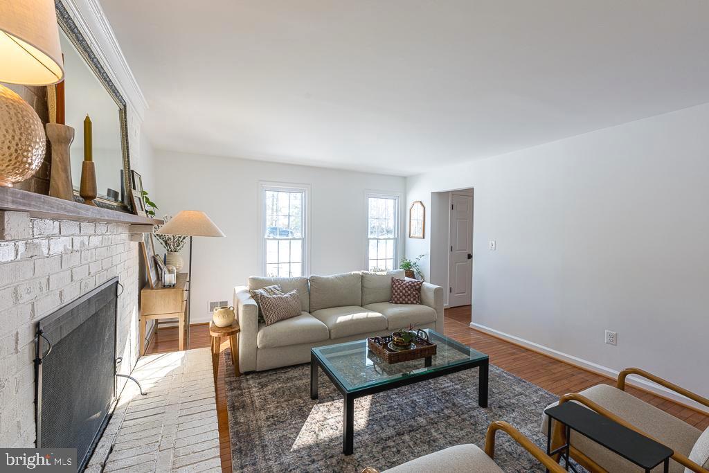 2510 Little River Road Haymarket, VA 20169 - Photo 16 of 39 a living room with furniture and a fireplace