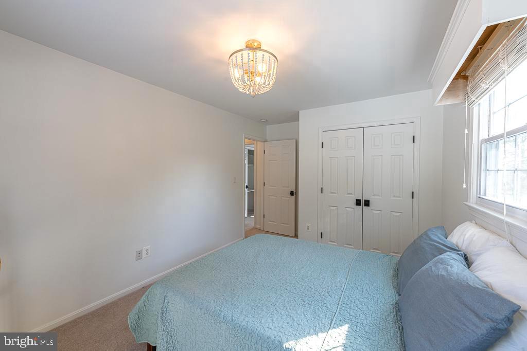 2510 Little River Road Haymarket, VA 20169 - Photo 29 of 39 a bedroom with a bed and a window