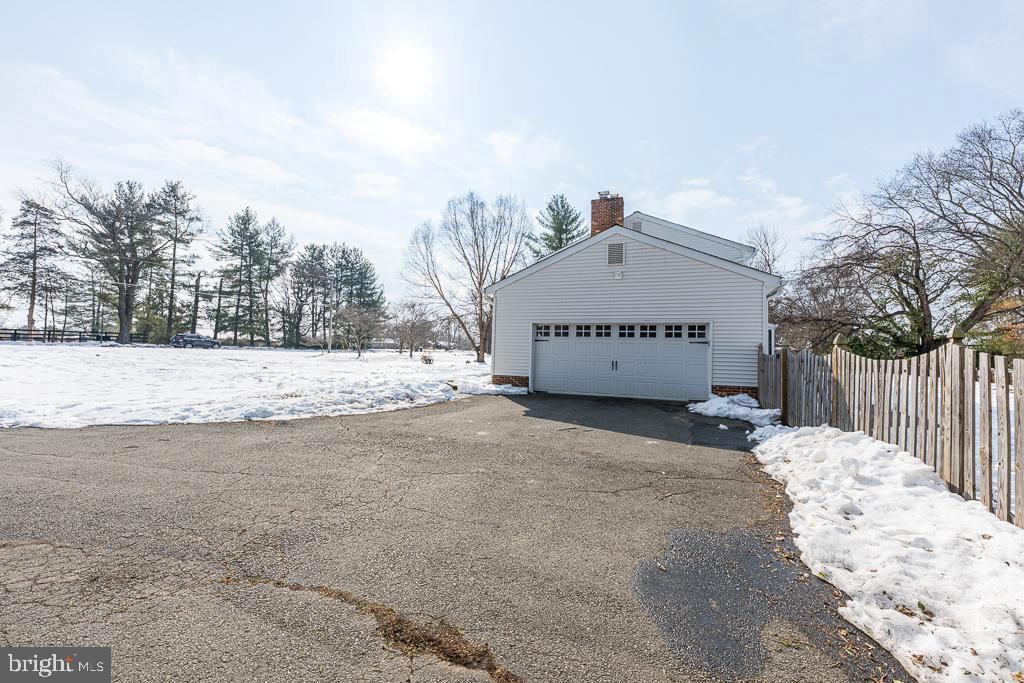2510 Little River Road Haymarket, VA 20169 - Photo 37 of 39 a view of a large white house with a snow on the road