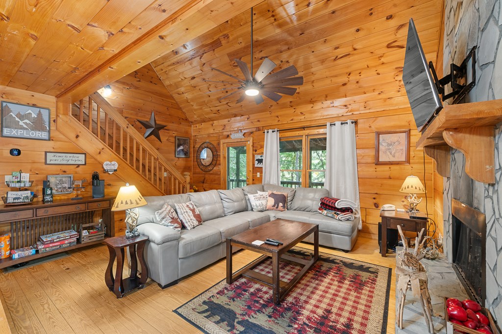 93 Amy Lane Ellijay, GA 30540 - Photo 12 of 61 a living room with furniture and a fireplace