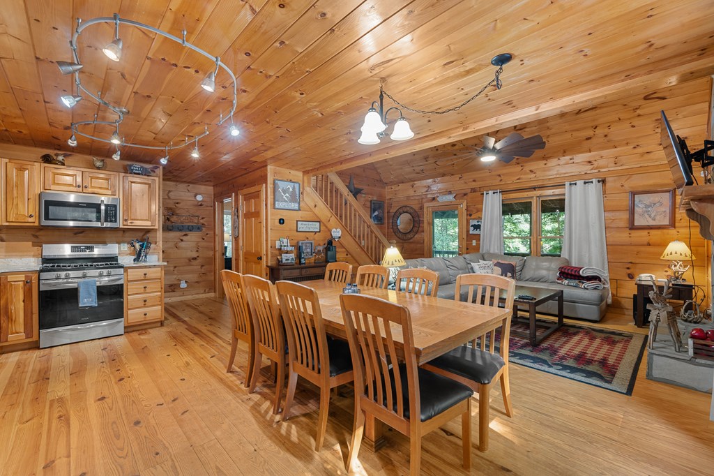 93 Amy Lane Ellijay, GA 30540 - Photo 18 of 61 a view of a dining room with furniture window and wooden floor