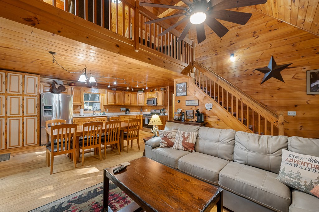93 Amy Lane Ellijay, GA 30540 - Photo 19 of 61 a living room with lots of furniture and a wooden floor