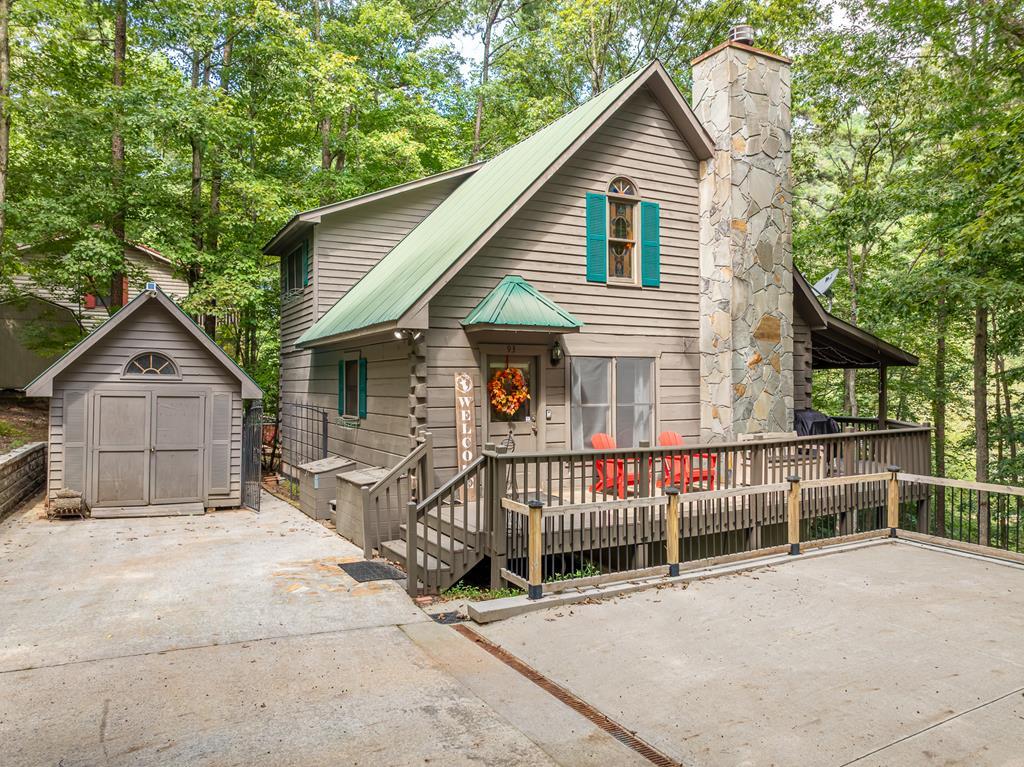 93 Amy Lane Ellijay, GA 30540 - Photo 2 of 61 a view of house with a outdoor and trees in the background