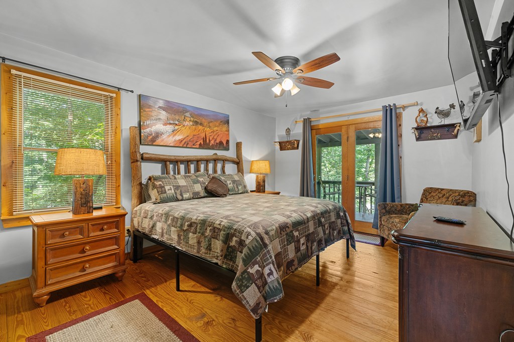 93 Amy Lane Ellijay, GA 30540 - Photo 33 of 61 a bedroom with a bed and a window