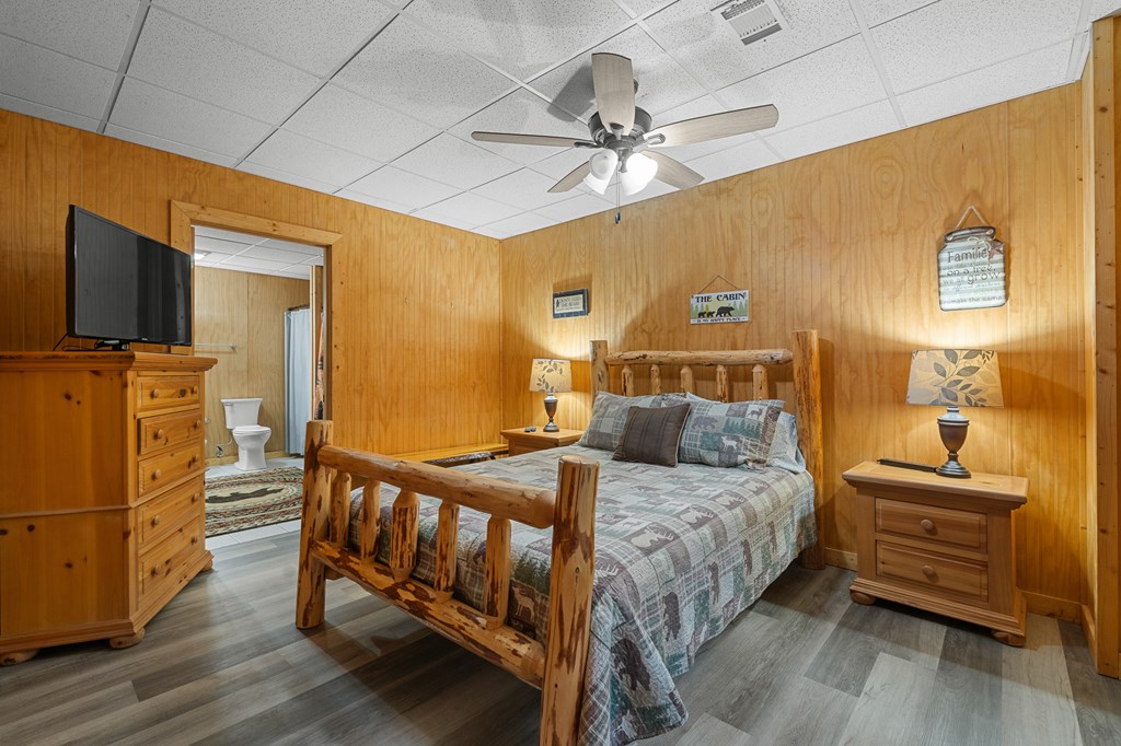 93 Amy Lane Ellijay, GA 30540 - Photo 40 of 61 a bedroom with a bed and wooden floor