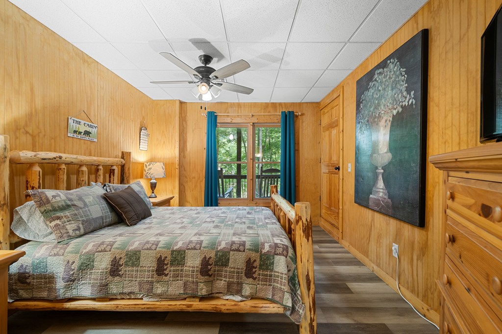 93 Amy Lane Ellijay, GA 30540 - Photo 41 of 61 a bedroom with a bed and wooden floor