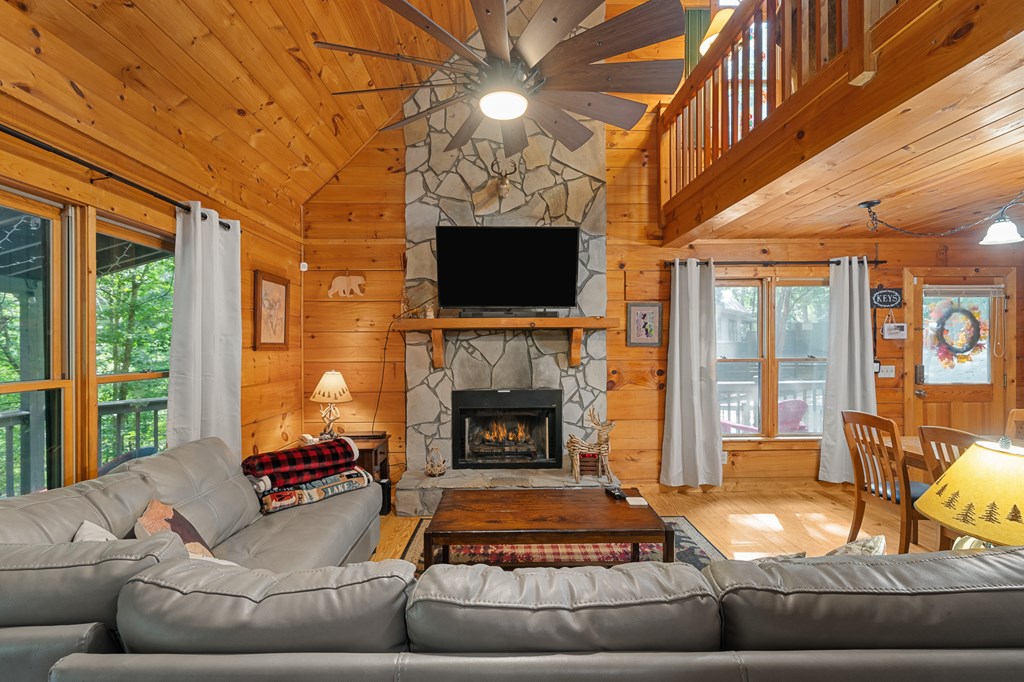93 Amy Lane Ellijay, GA 30540 - Photo 9 of 61 a living room with furniture and a fireplace
