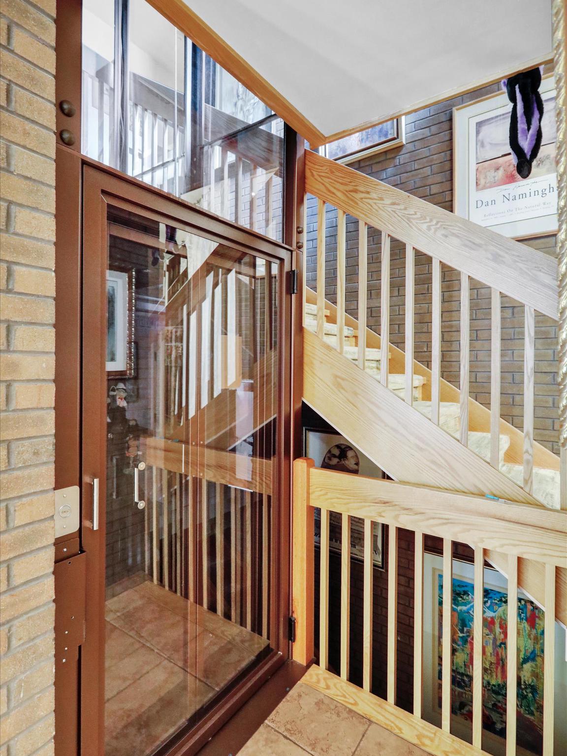 1617 Meadowlark Road Wyomissing, PA 19610 - Photo 20 of 36 Custom elevator w view of staircase