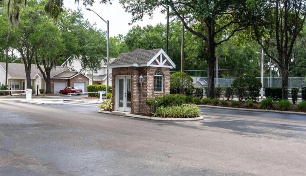 4700 Southwest Archer Road, Unit M90 Gainesville, FL 32608 - Photo 2 of 35 a front view of a house with a yard
