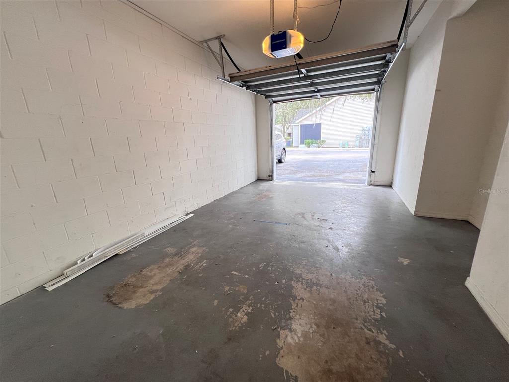 4700 Southwest Archer Road, Unit M90 Gainesville, FL 32608 - Photo 23 of 35 a view of empty room with wooden floor