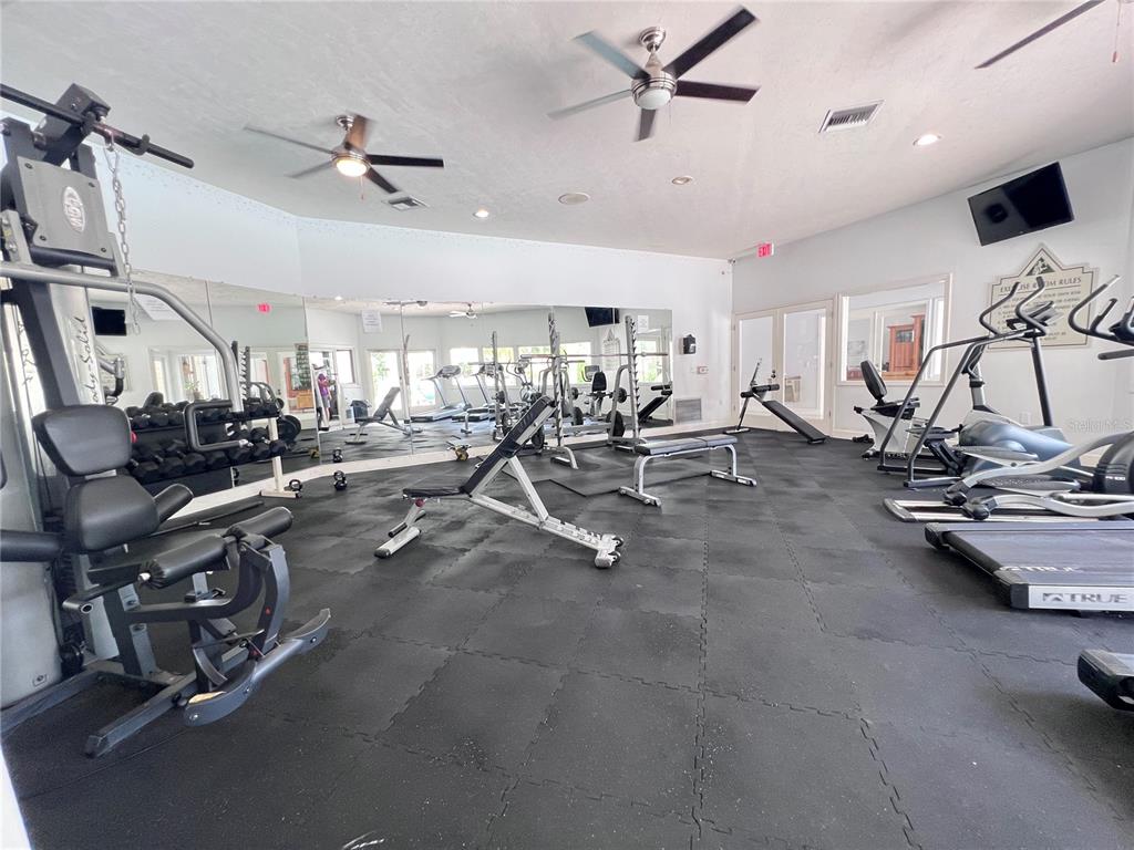 4700 Southwest Archer Road, Unit M90 Gainesville, FL 32608 - Photo 28 of 35 a view of a room with gym equipment