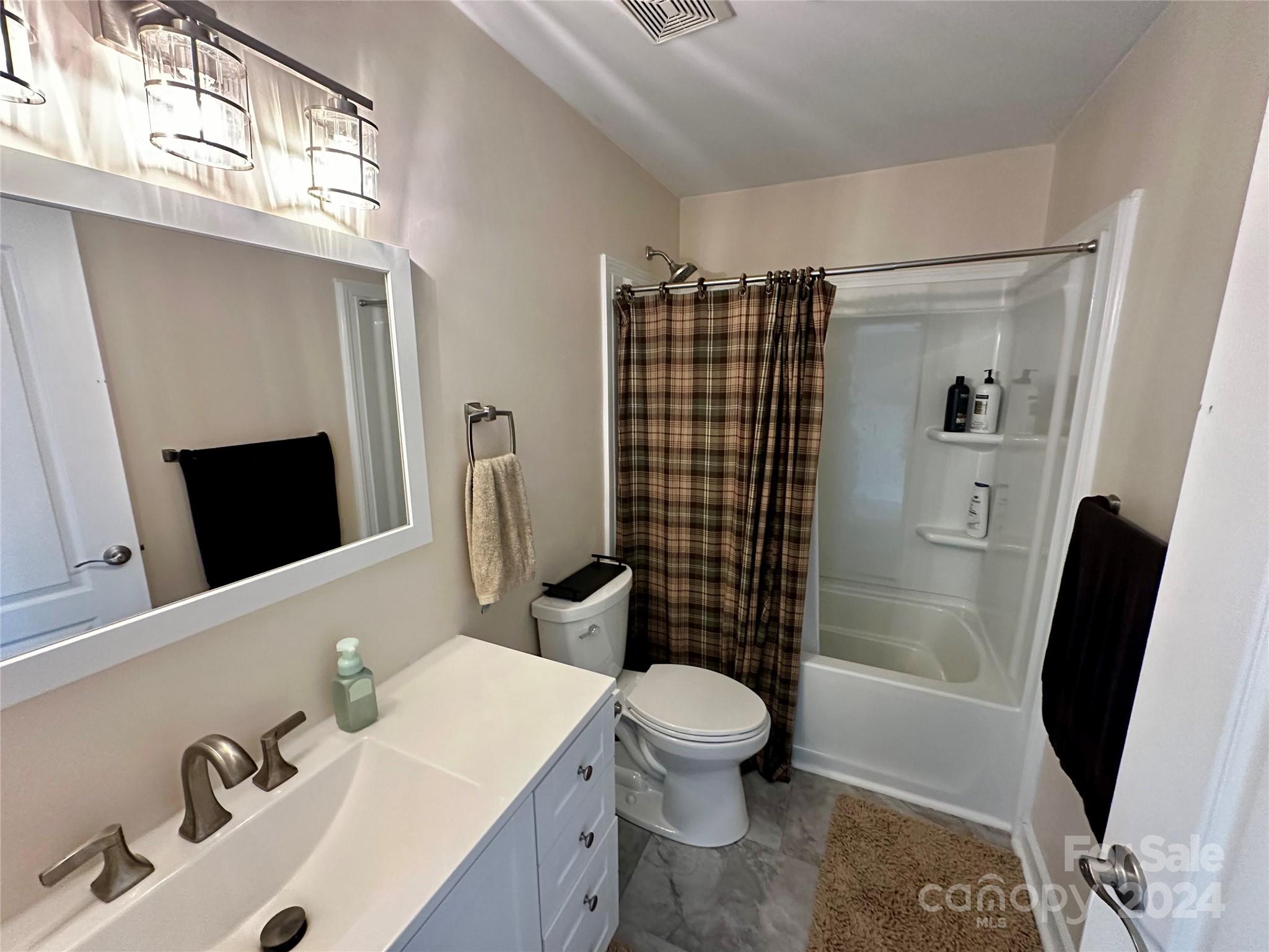 4108 Johnson Road Jefferson, SC 29718 - Photo 24 of 39 a bathroom with a sink toilet and shower