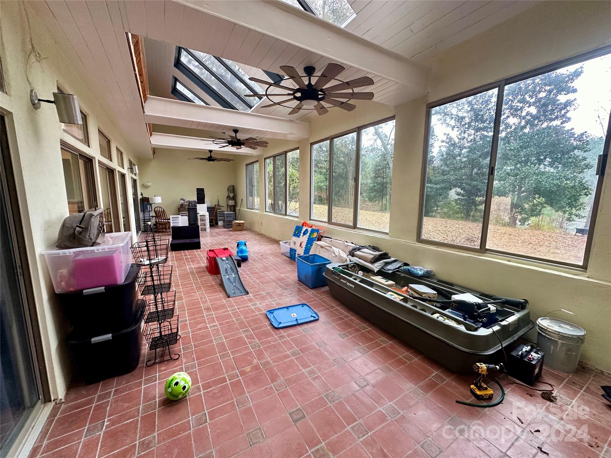4108 Johnson Road Jefferson, SC 29718 - Photo 28 of 39 a living room with furniture and a floor to ceiling window