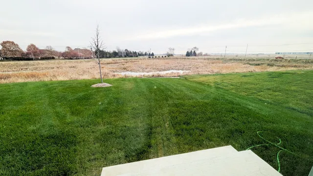 a view of a lake from a balcony
