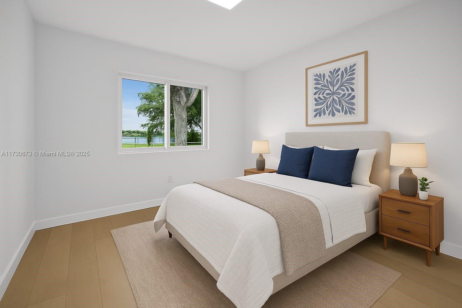 8745 Southwest 175th Street Palmetto Bay, FL 33157 - Photo 11 of 37 a bedroom with a bed and a window