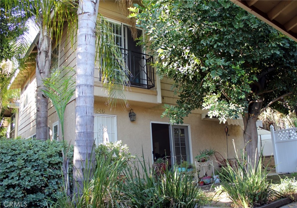 246 East Howard Street Pasadena, CA 91104 - Photo 1 of 25 front view of a house with a tree