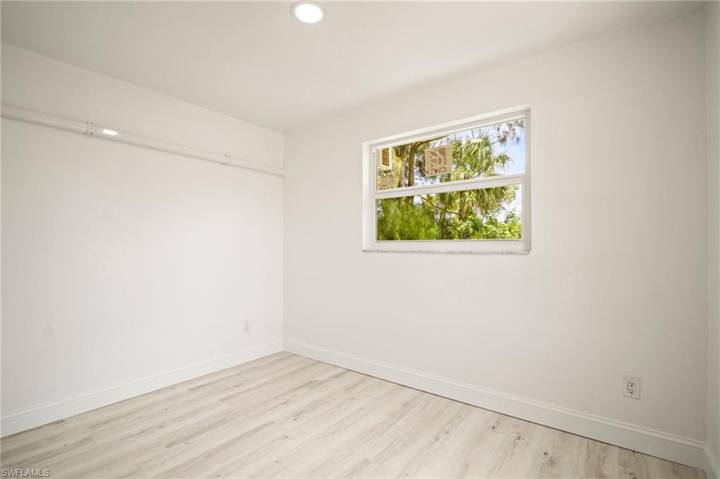 2316 Bayside Street Naples, FL 34112 - Photo 12 of 24 an empty room with a window