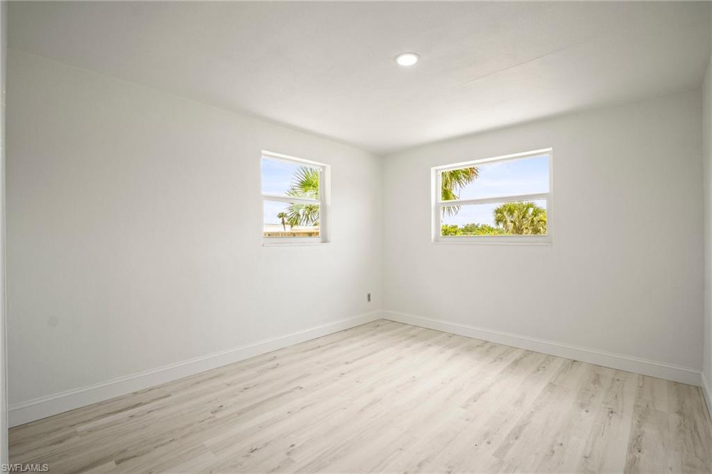 2316 Bayside Street Naples, FL 34112 - Photo 24 of 24 an empty room with a window