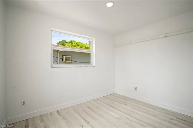 an empty room with window