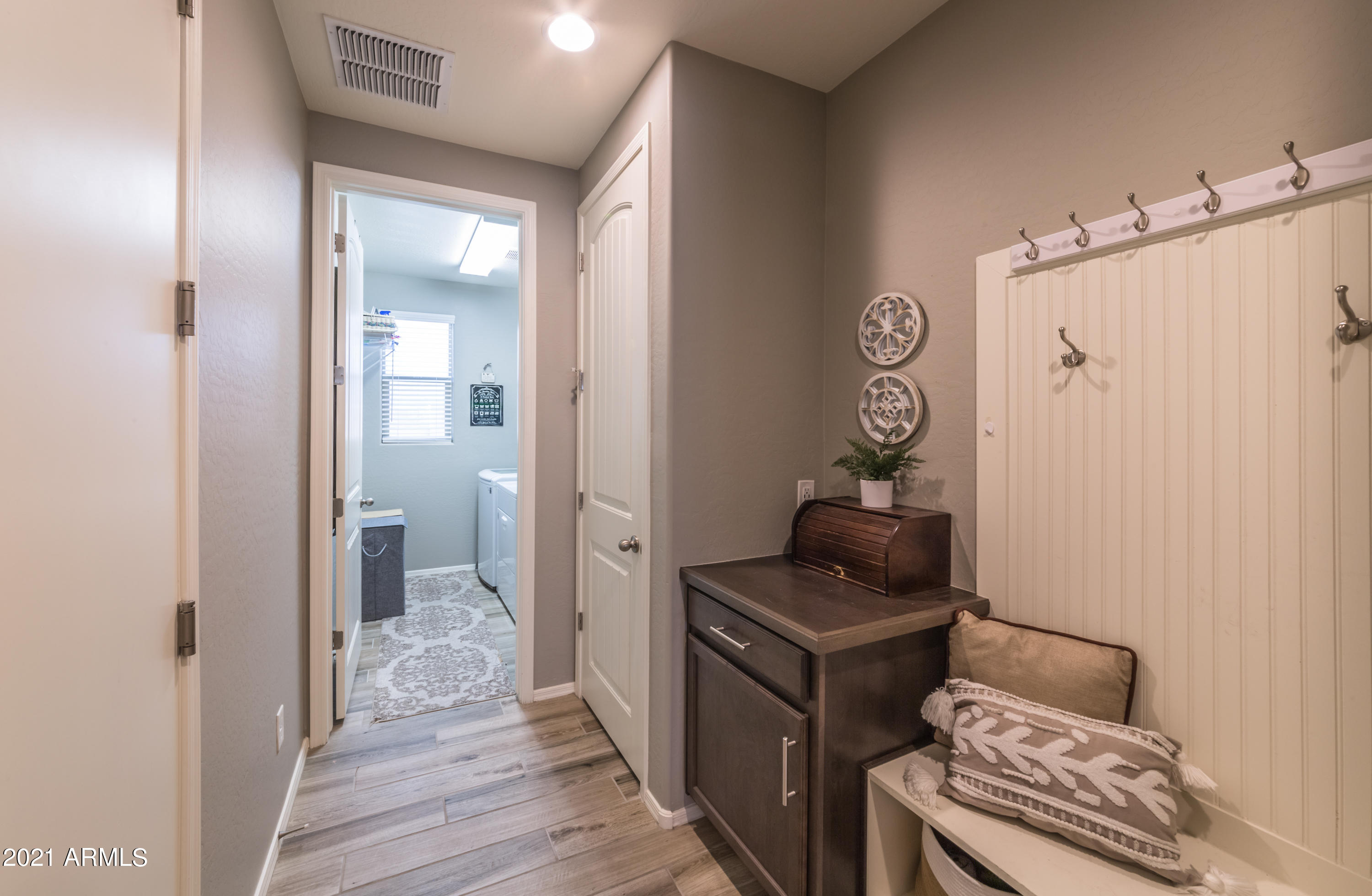 21070 West Almeria Road Buckeye, AZ 85396 - Photo 10 of 22 LaundryHallway