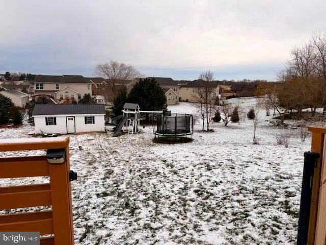 a view of a terrace with a barbeque