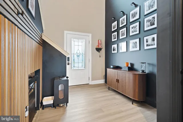 a view of a kitchen with furniture and a window