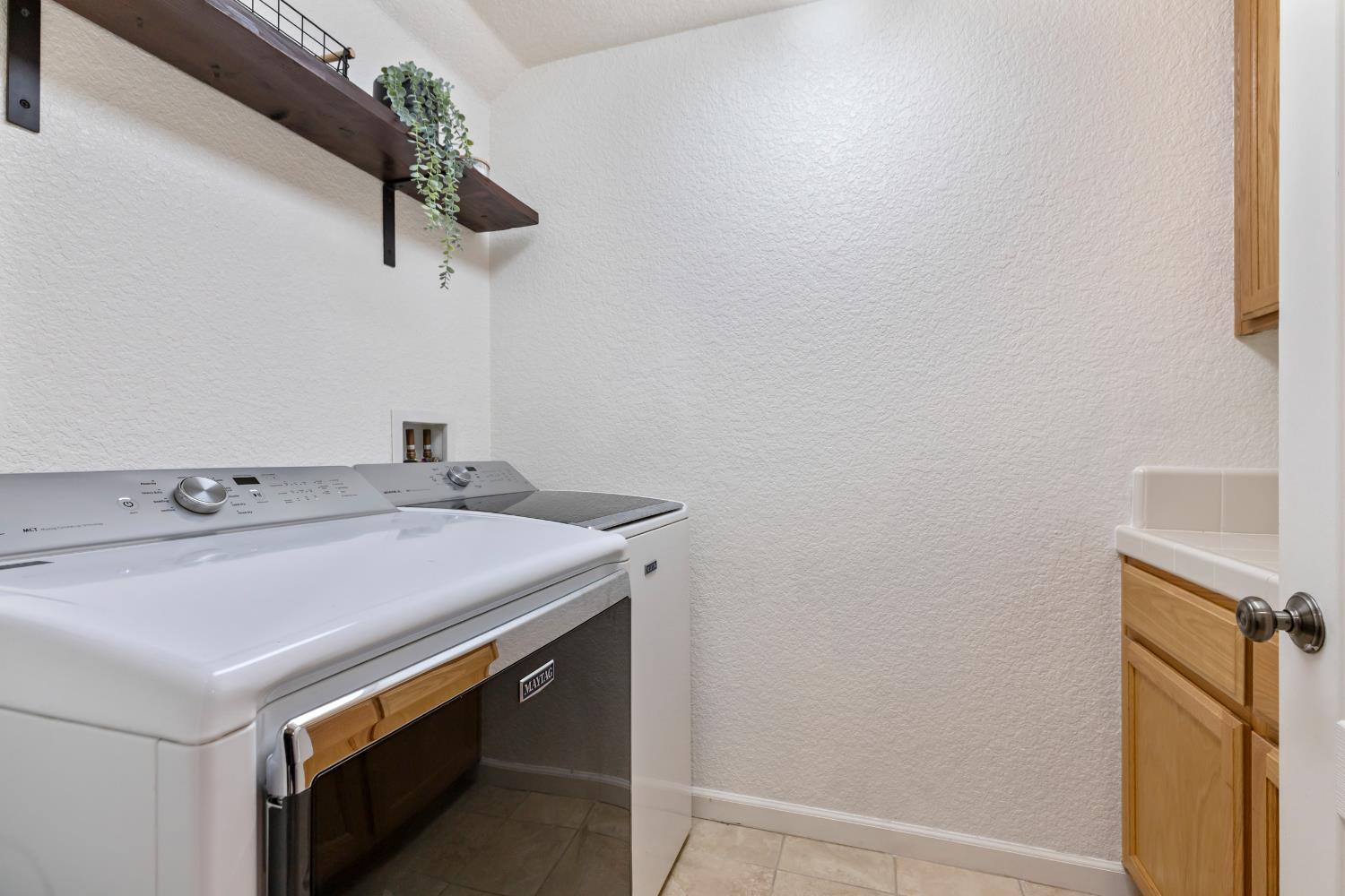 2836 Tabriz Drive Modesto, CA 95355 - Photo 18 of 35 a utility room with dryer and washer