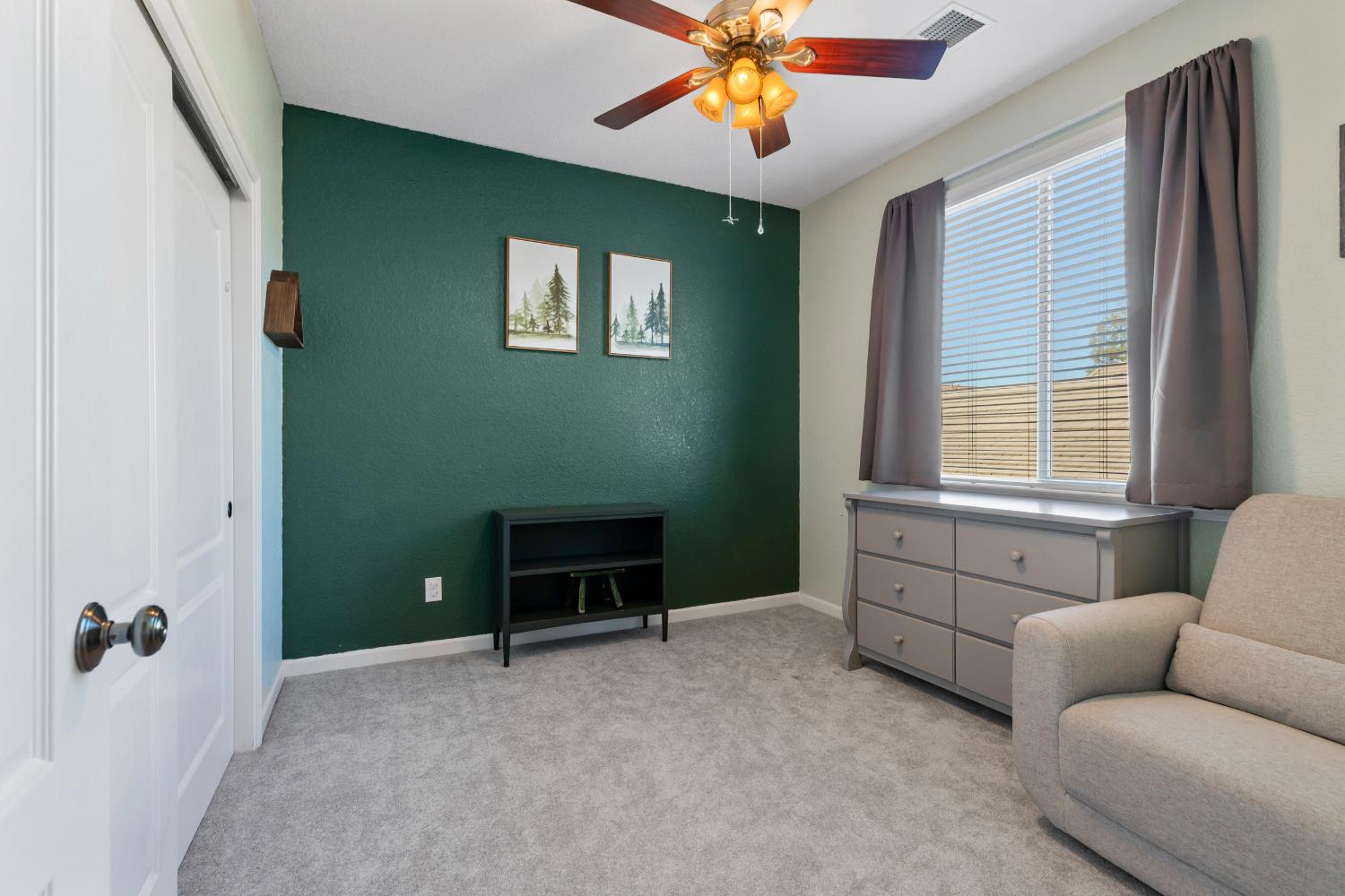 2836 Tabriz Drive Modesto, CA 95355 - Photo 20 of 35 a living room with furniture and a window