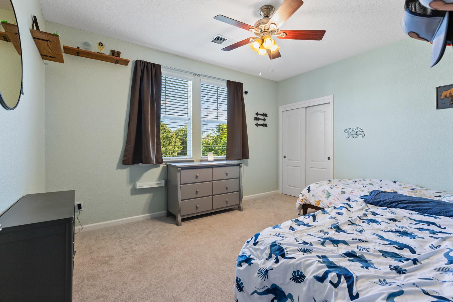 2836 Tabriz Drive Modesto, CA 95355 - Photo 21 of 35 a bedroom with a bed and a window