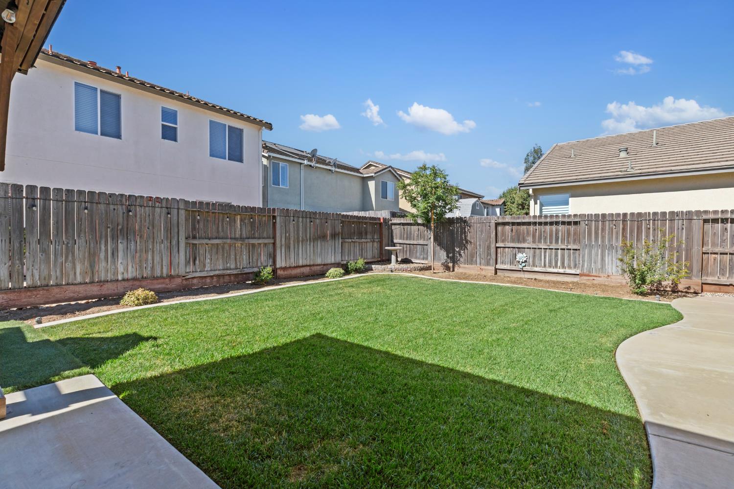 2836 Tabriz Drive Modesto, CA 95355 - Photo 25 of 35 a view of a house with a yard and sitting area