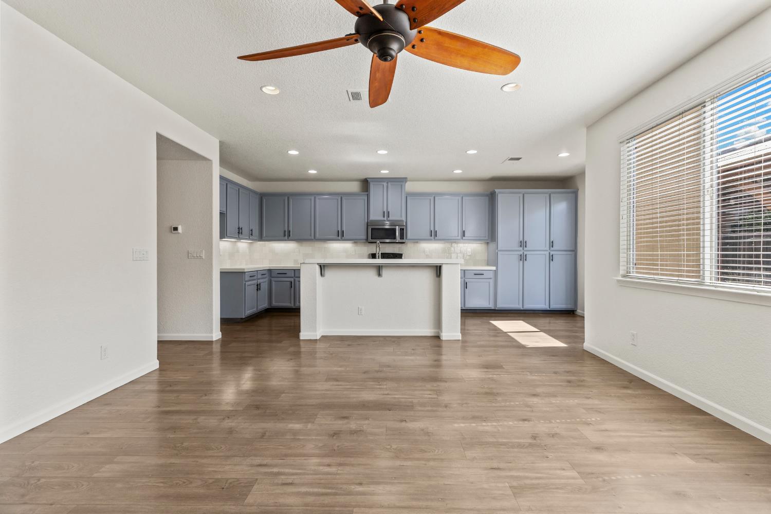 2836 Tabriz Drive Modesto, CA 95355 - Photo 9 of 35 a view of a kitchen with a sink cabinets and a window