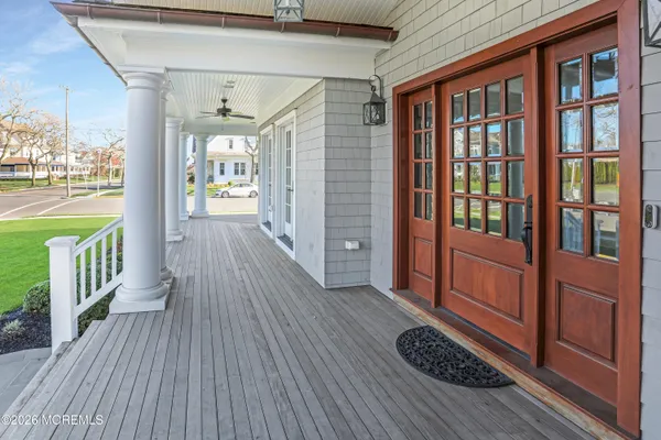 a view of front door deck and living room