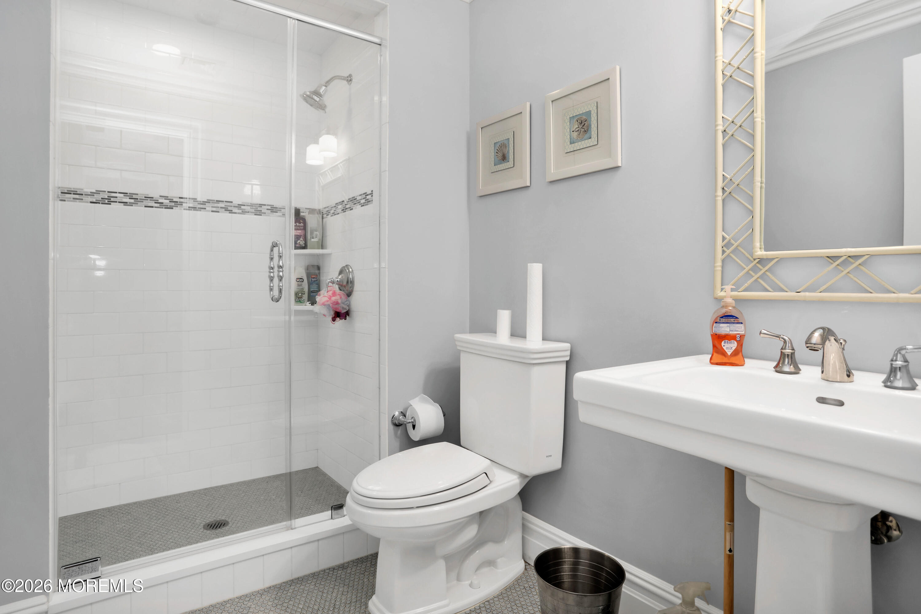 101 Tuttle Avenue Spring Lake, NJ 07762 - Photo 49 of 64 a bathroom with a sink toilet and shower