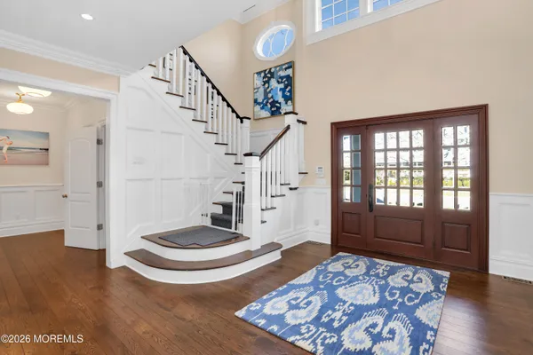 a living room with a bath tub and a rug