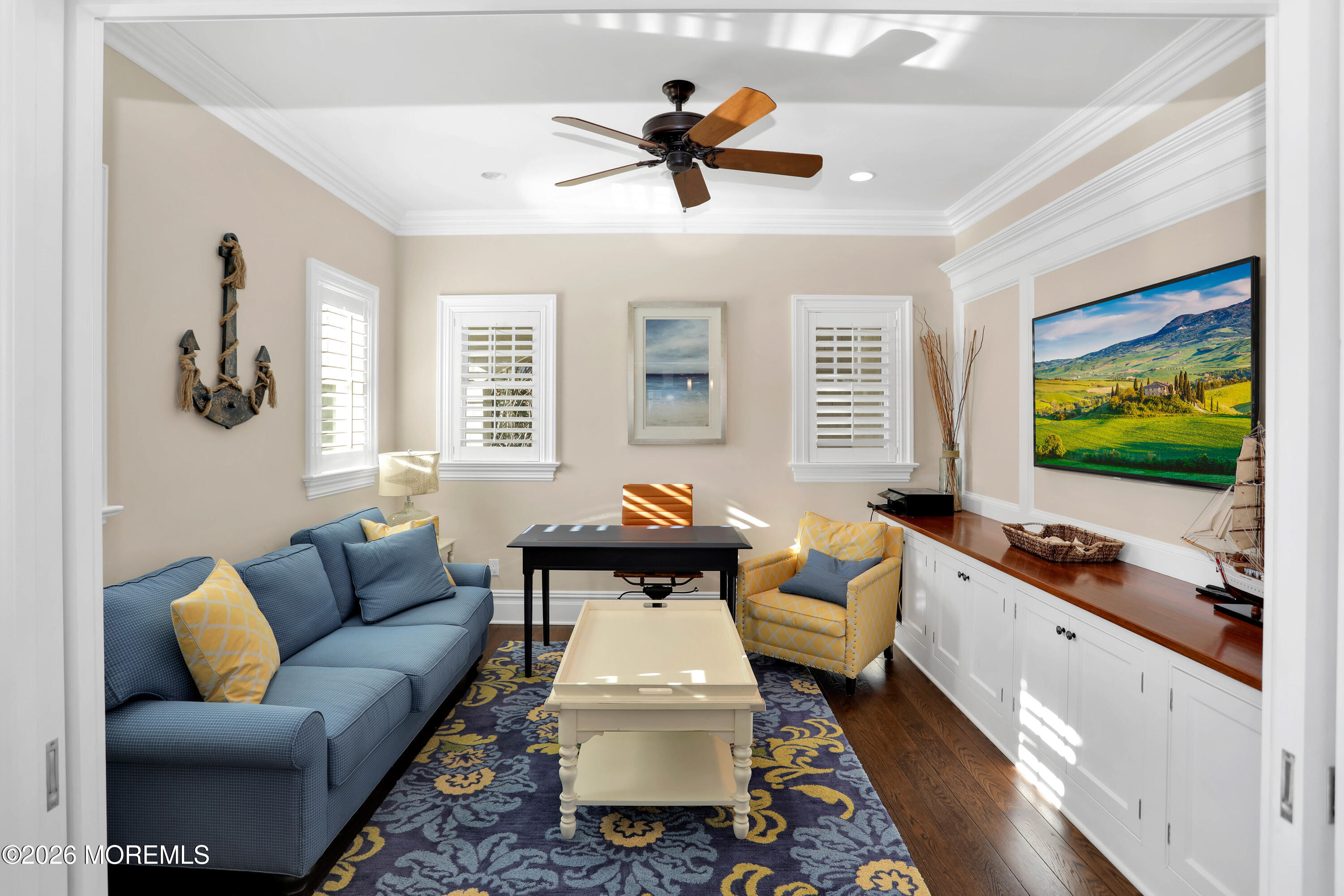 101 Tuttle Avenue Spring Lake, NJ 07762 - Photo 9 of 64 a living room with furniture and a flat screen tv