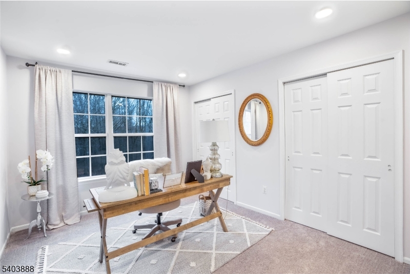 8 Springholm Drive Berkeley Heights, NJ 07922 - Photo 6 of 19 a living room with furniture a window and a potted plant