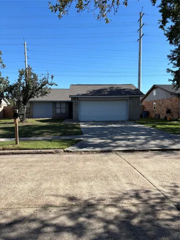 a view of a house with a swimming pool