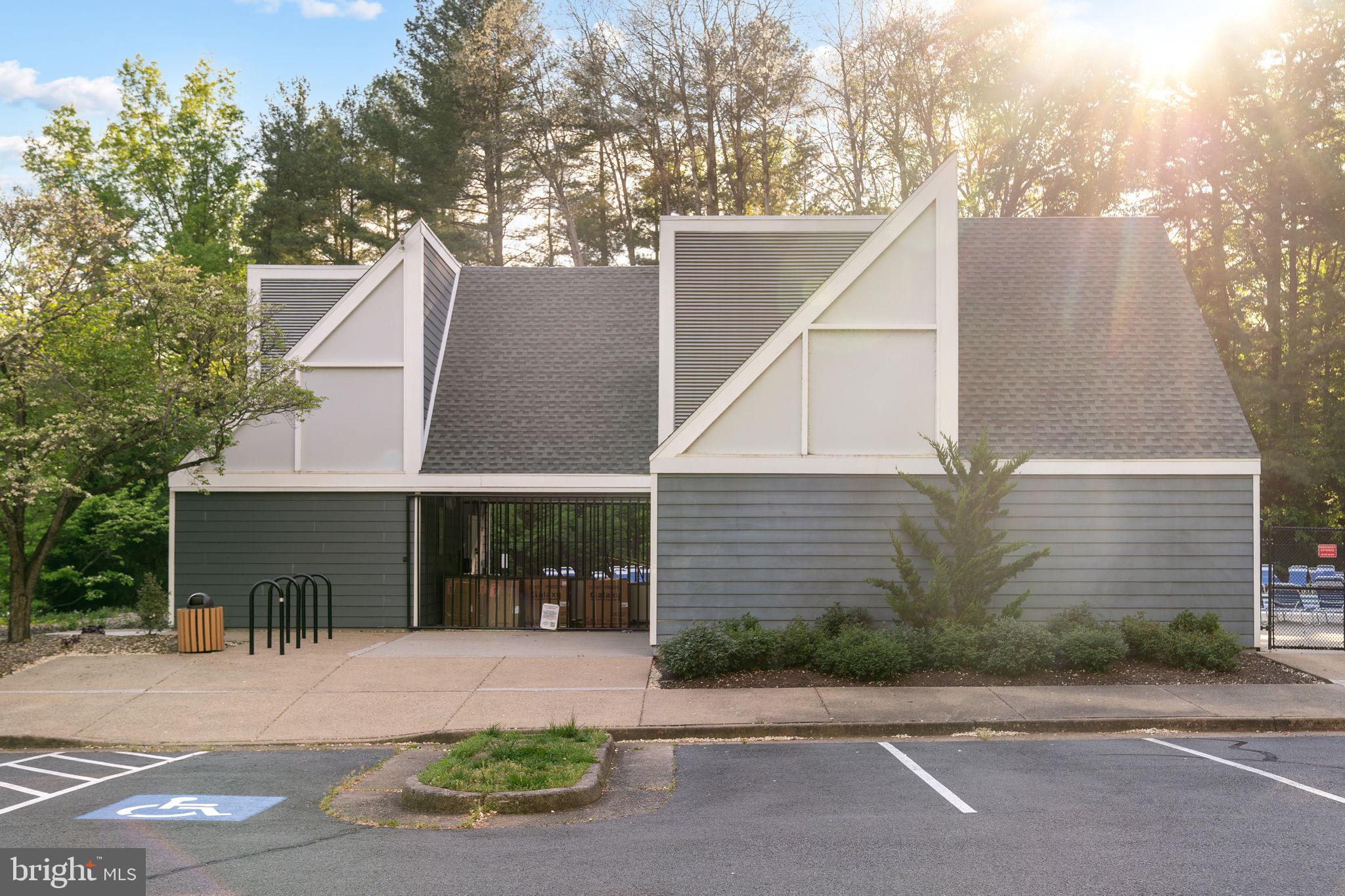 11163 Lake Chapel Lane Reston, VA 20191 - Photo 103 of 129 a front view of a house with a yard and garage