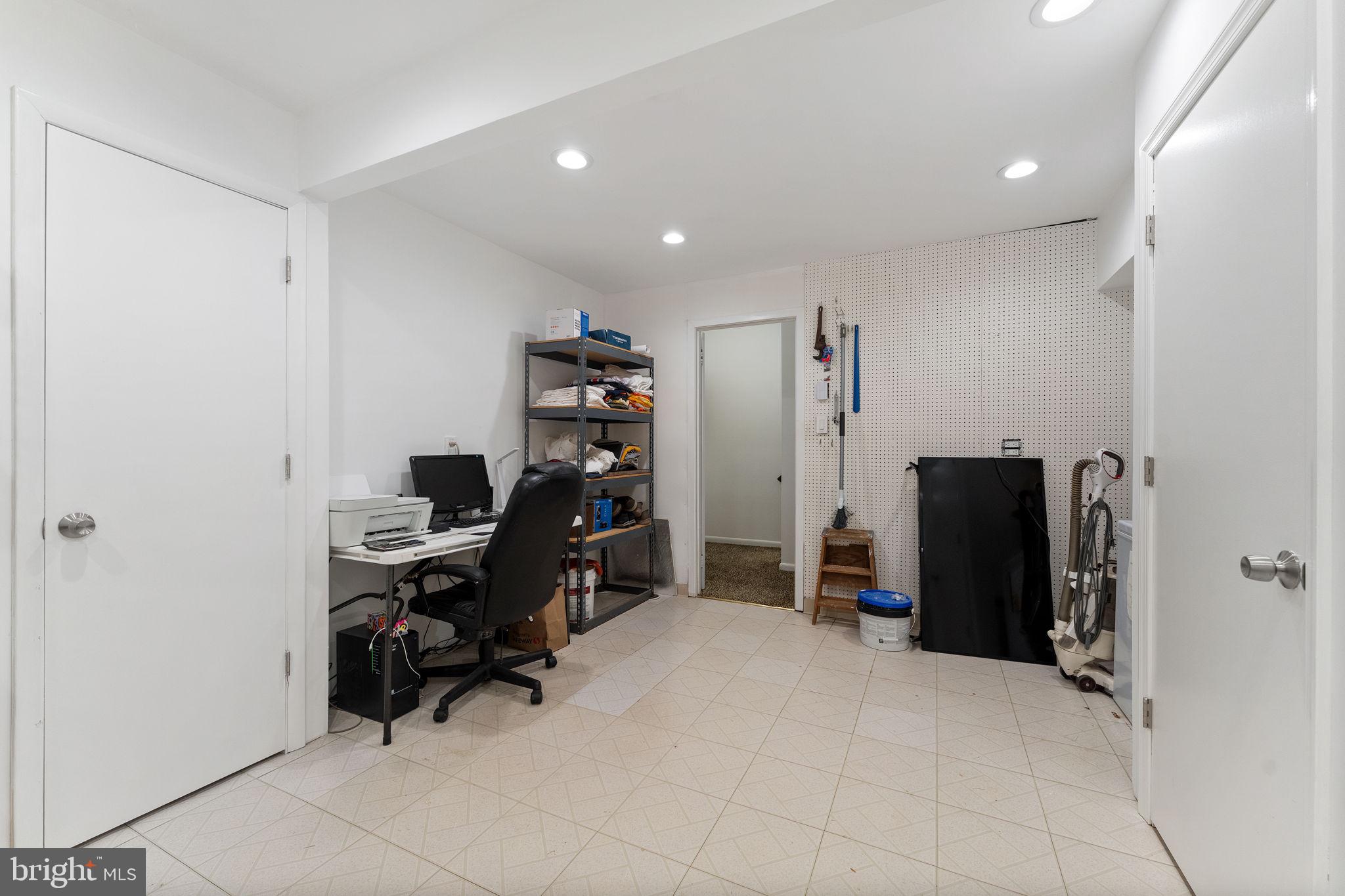 11163 Lake Chapel Lane Reston, VA 20191 - Photo 66 of 129 a view of a workspace with furniture