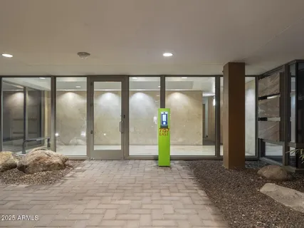 a outdoor space with lots of table and chairs