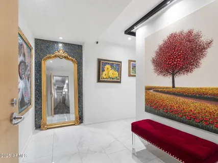 a view of a dining room with furniture wooden floor and chandelier