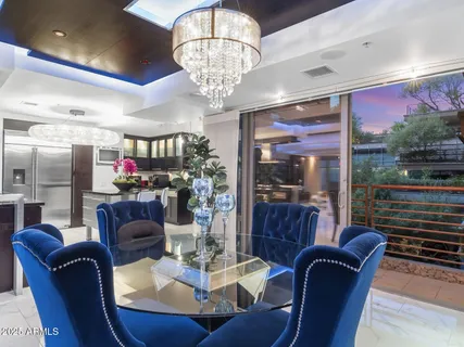 a kitchen with stainless steel appliances granite countertop a sink and a counter