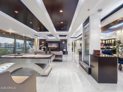 a bathroom with a glass shower door and a shower