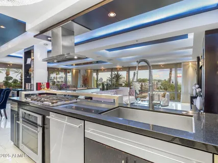 a bathroom with a sink double vanity and a mirror