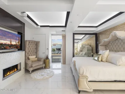 a view of a backyard with sitting area and furniture