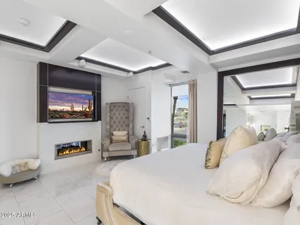 a view of a patio with a table chairs and backyard