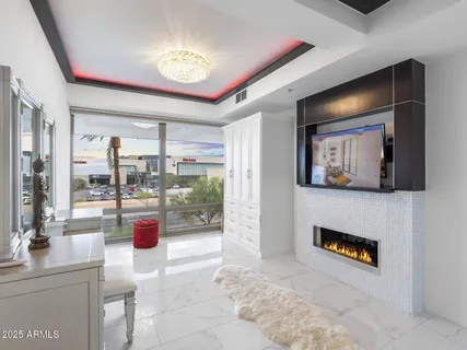 a view of a backyard with plants and a patio